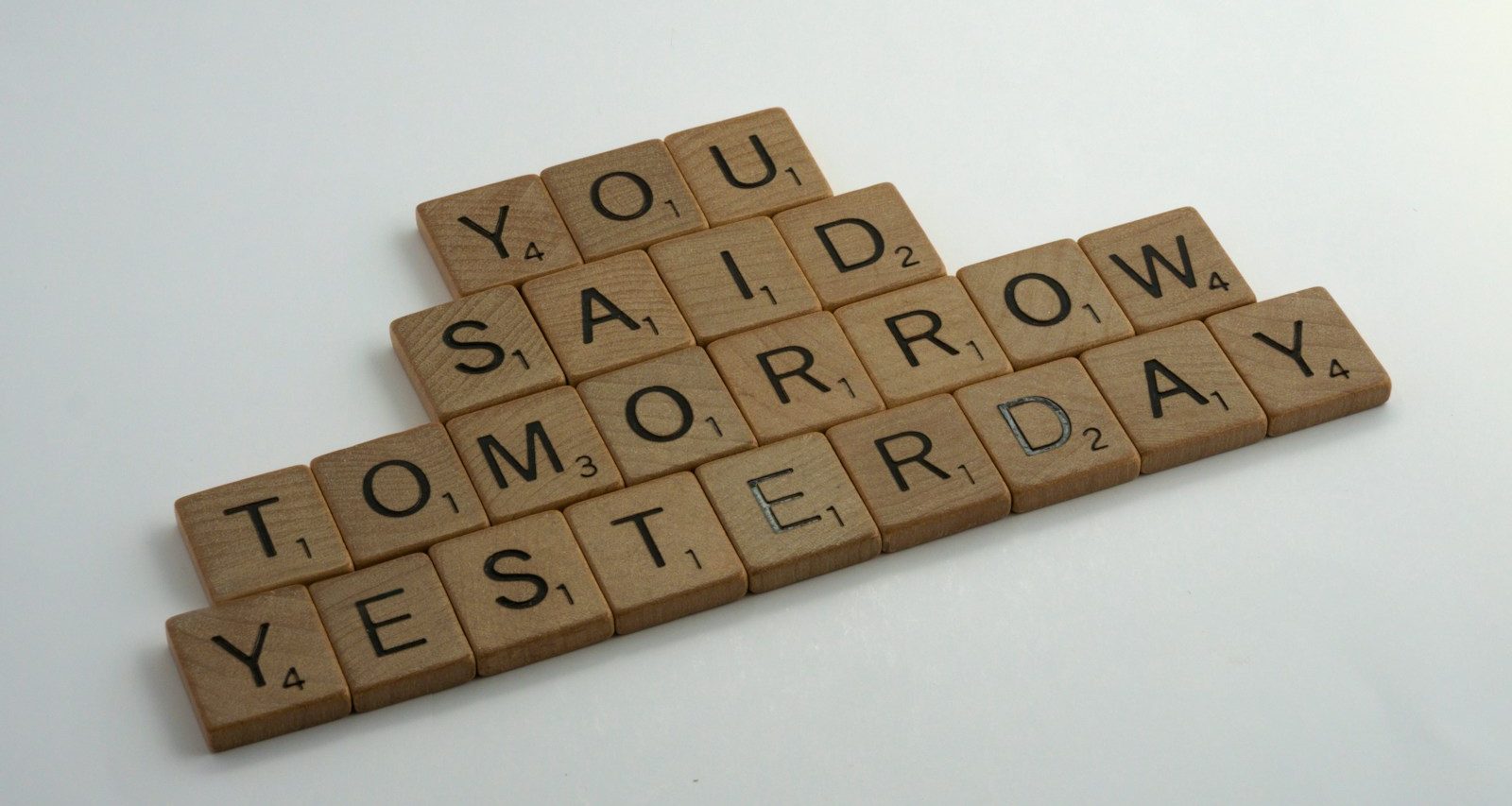 brown wooden blocks on white table